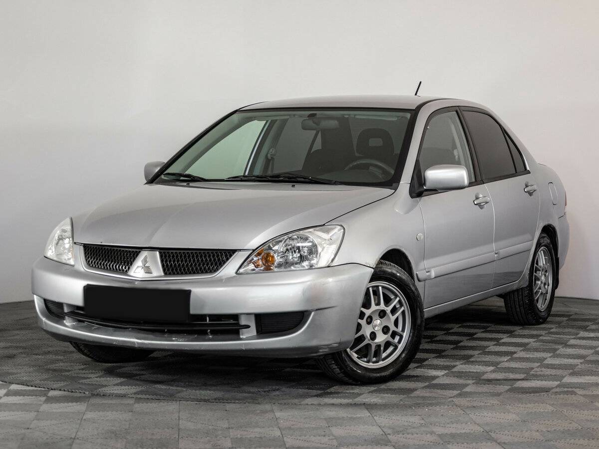 Mitsubishi Lancer с пробегом — 2006 год. Фото: #0
