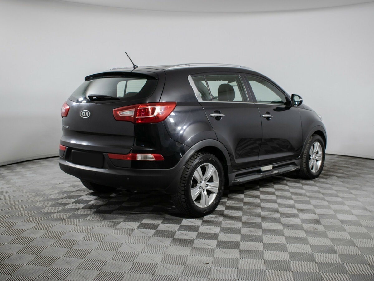 Kia Sportage с пробегом — 2011 год. Фото: #4