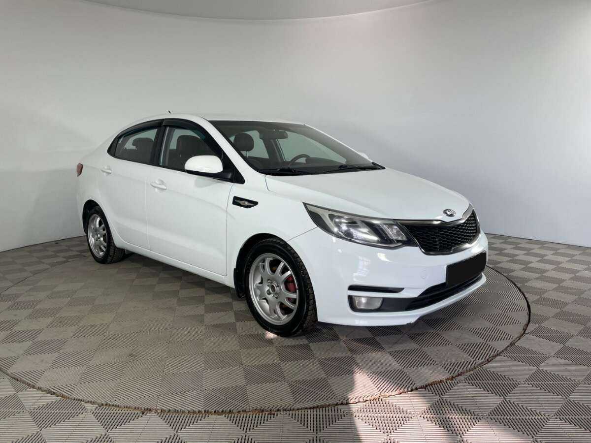 Kia Rio с пробегом — 2015 год. Фото: #2