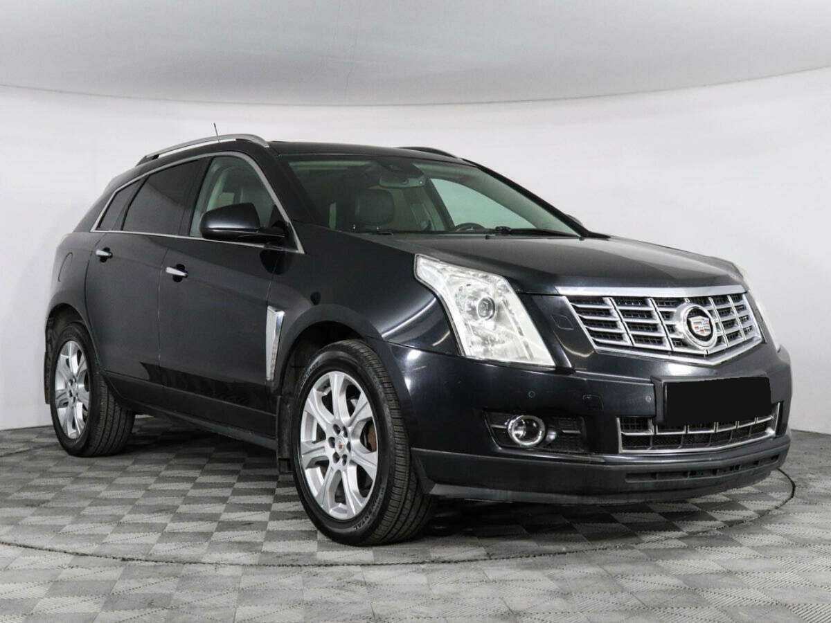 Cadillac SRX с пробегом — 2013 год. Фото: #2