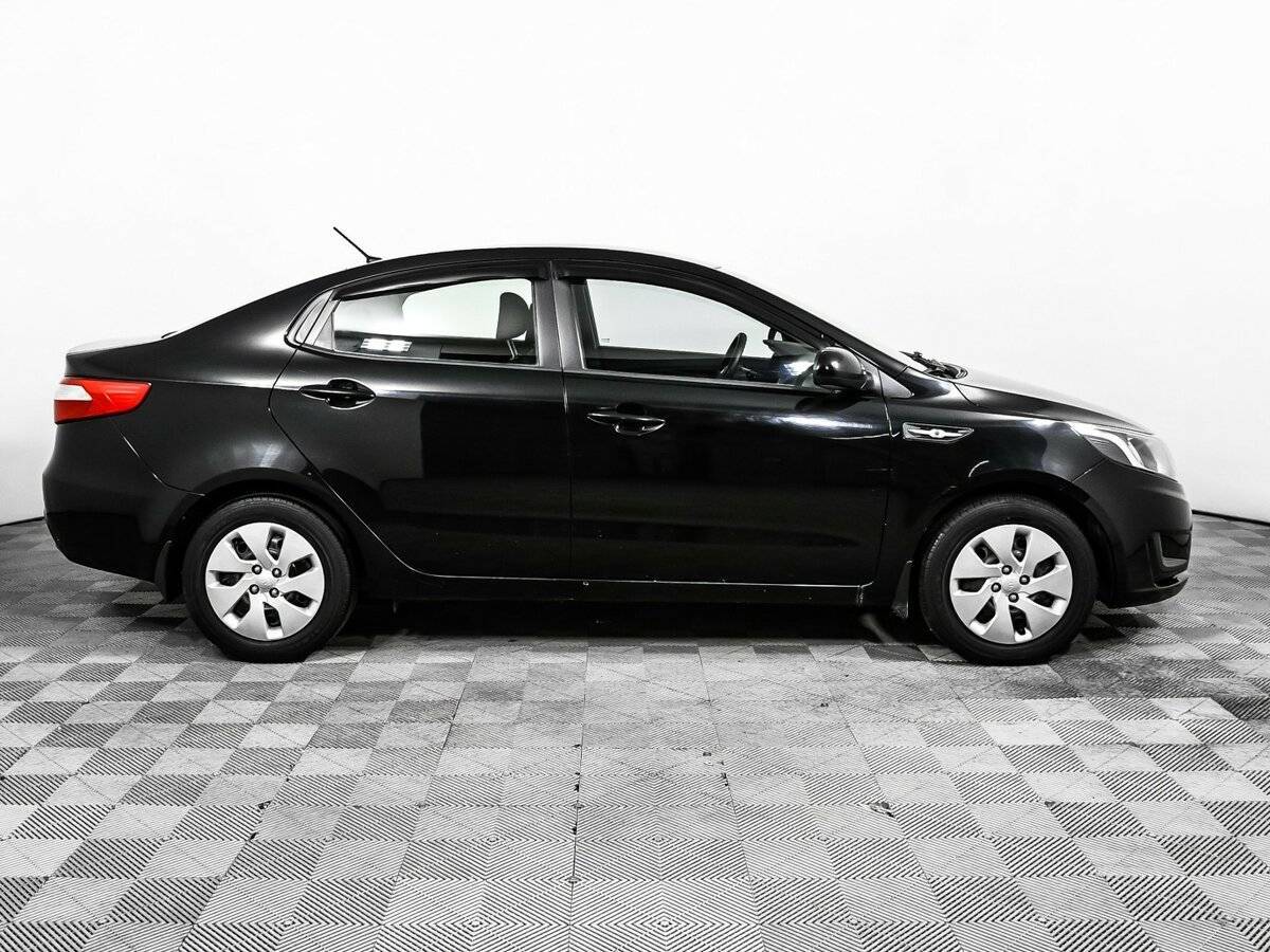 Kia Rio с пробегом — 2011 год. Фото: #3