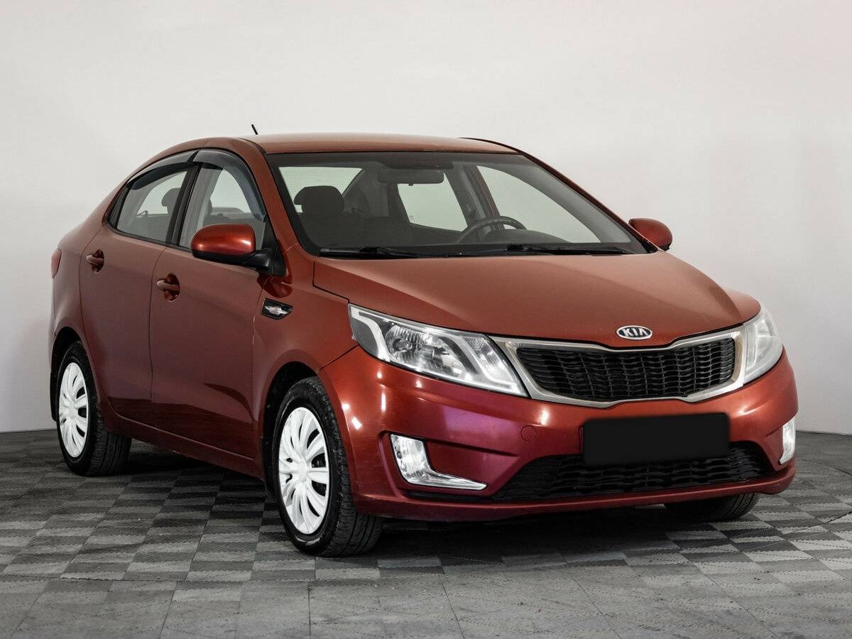 Kia Rio с пробегом — 2011 год. Фото: #2