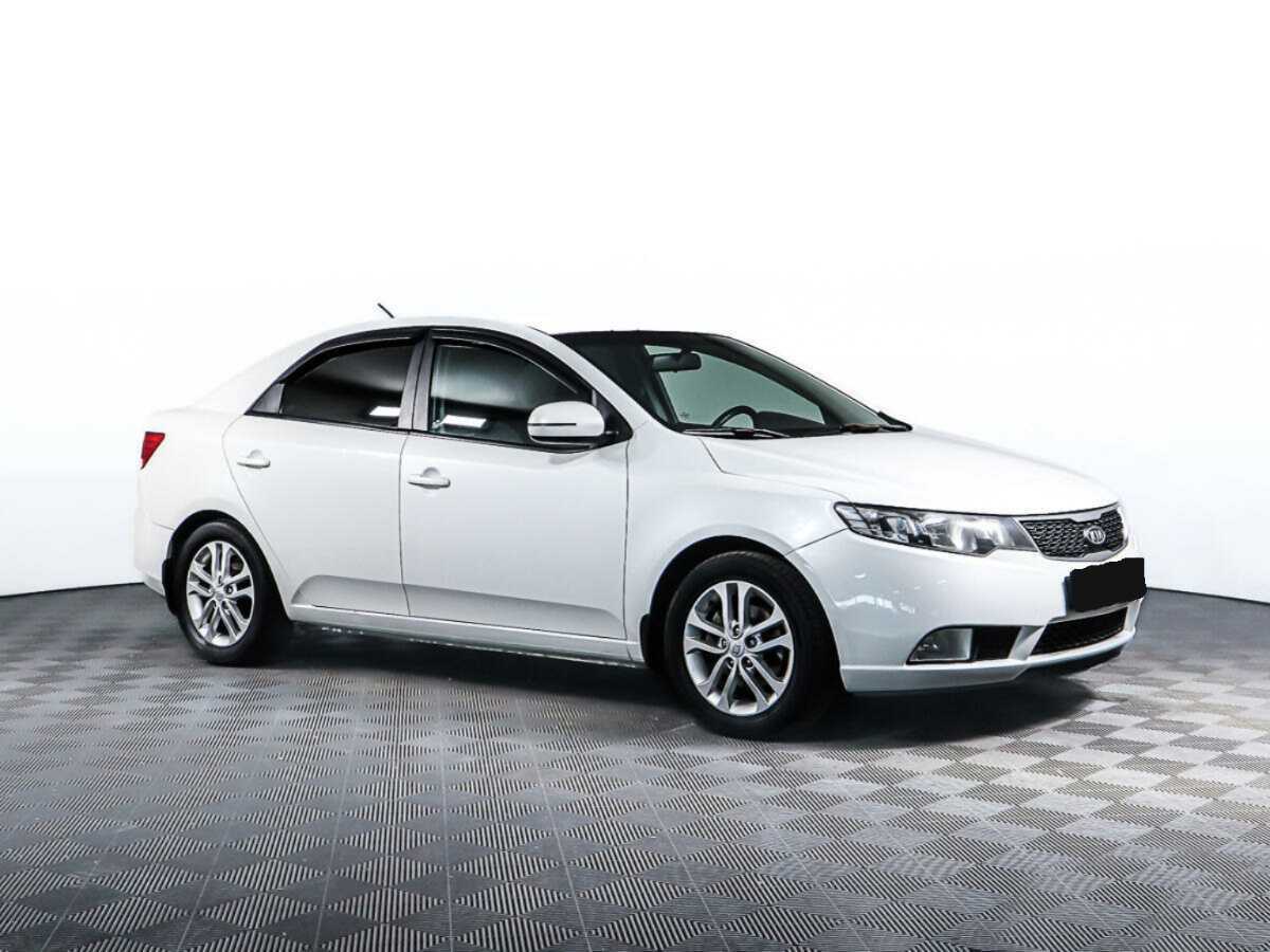 Kia Cerato с пробегом — 2012 год. Фото: #2