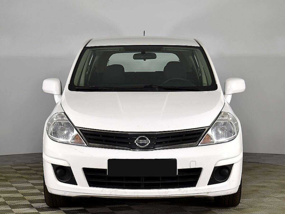 Nissan Tiida с пробегом — 2013 год. Фото: #2