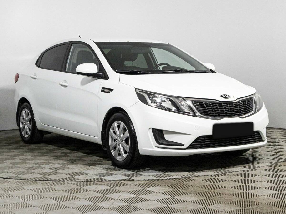 Kia Rio с пробегом — 2014 год. Фото: #2