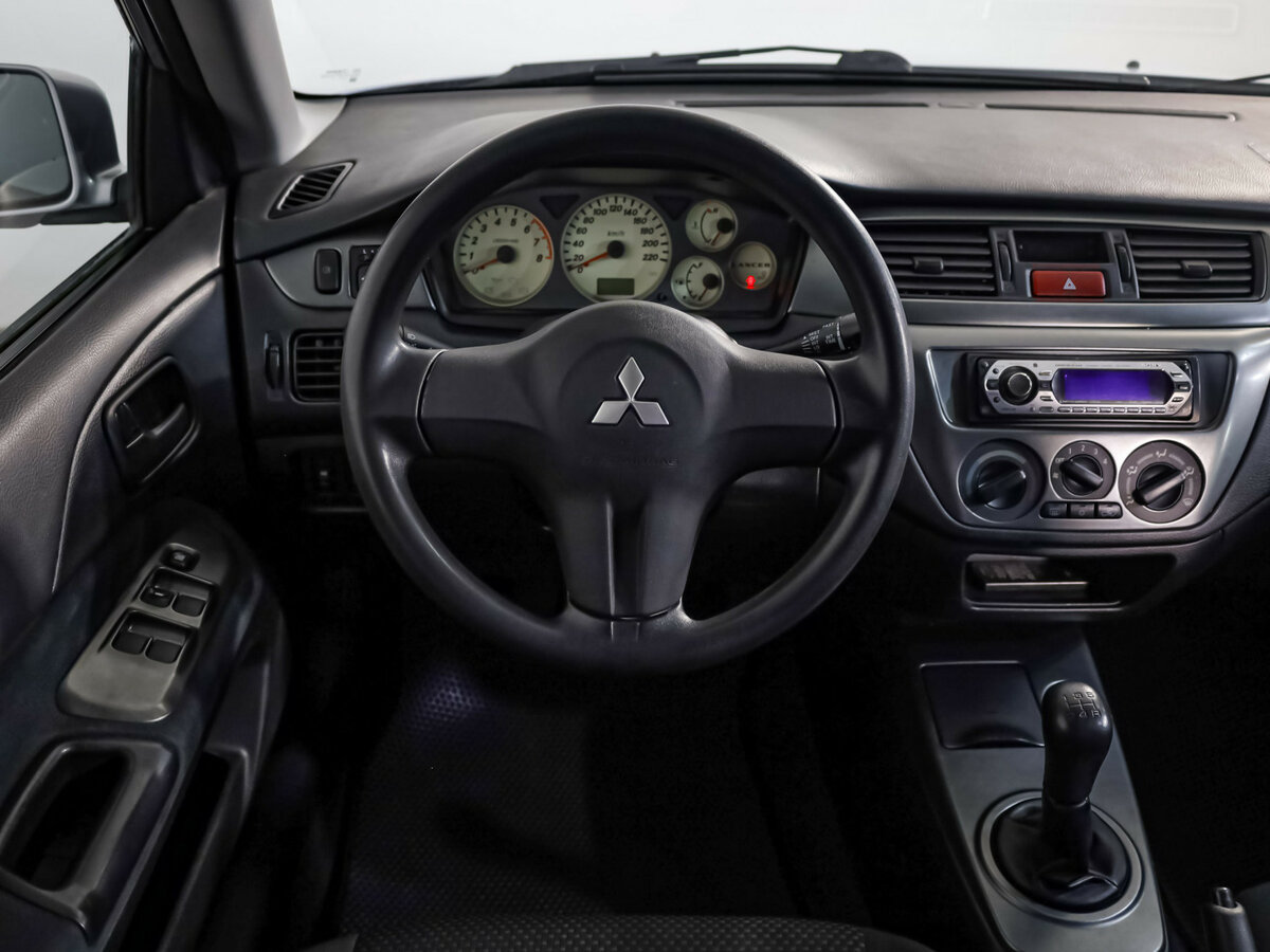 Mitsubishi Lancer с пробегом — 2006 год. Фото: #8