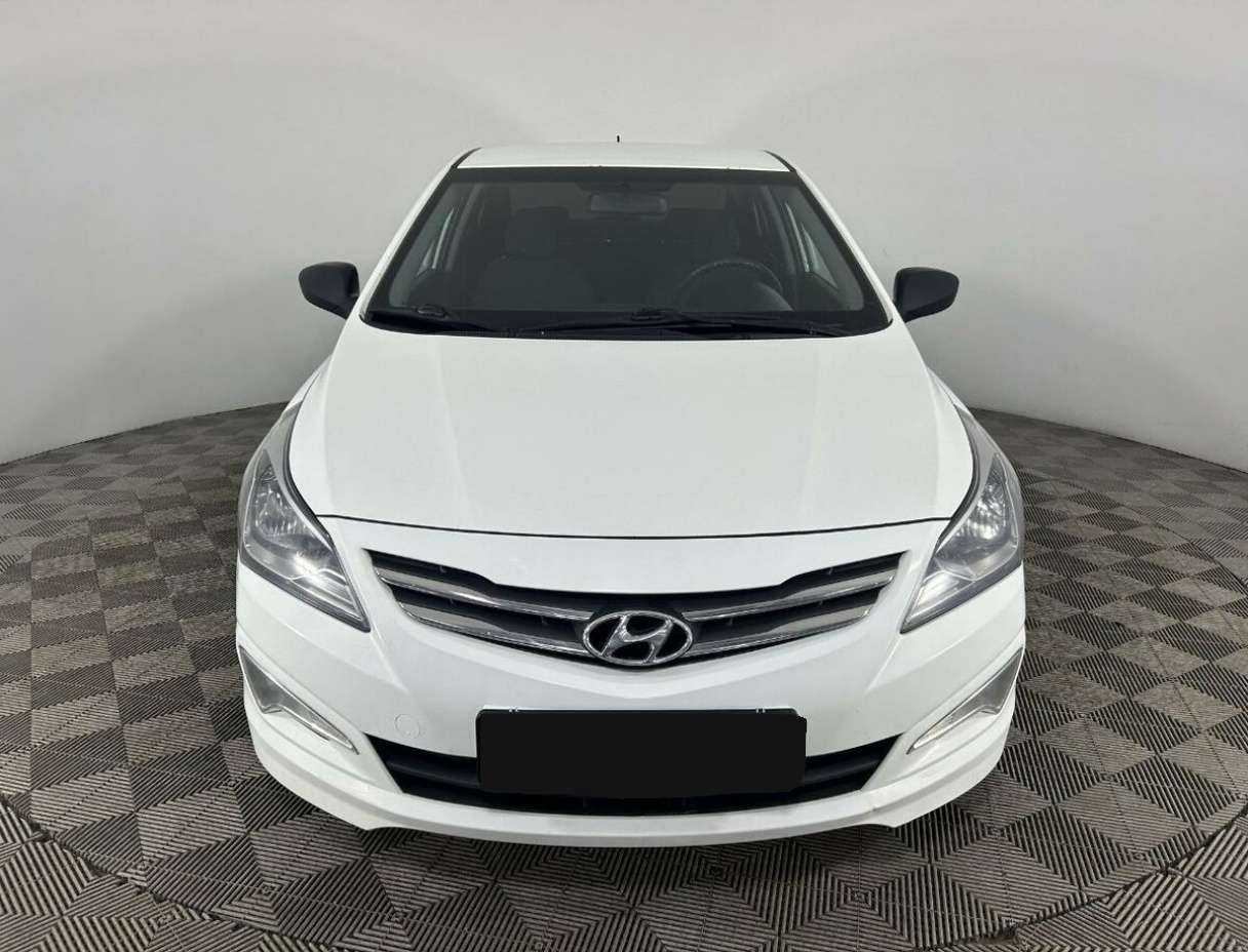 Hyundai Solaris с пробегом — 2015 год. Фото: #1