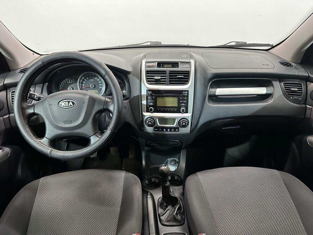 Kia Sportage с пробегом — 2010 год. Фото: #8