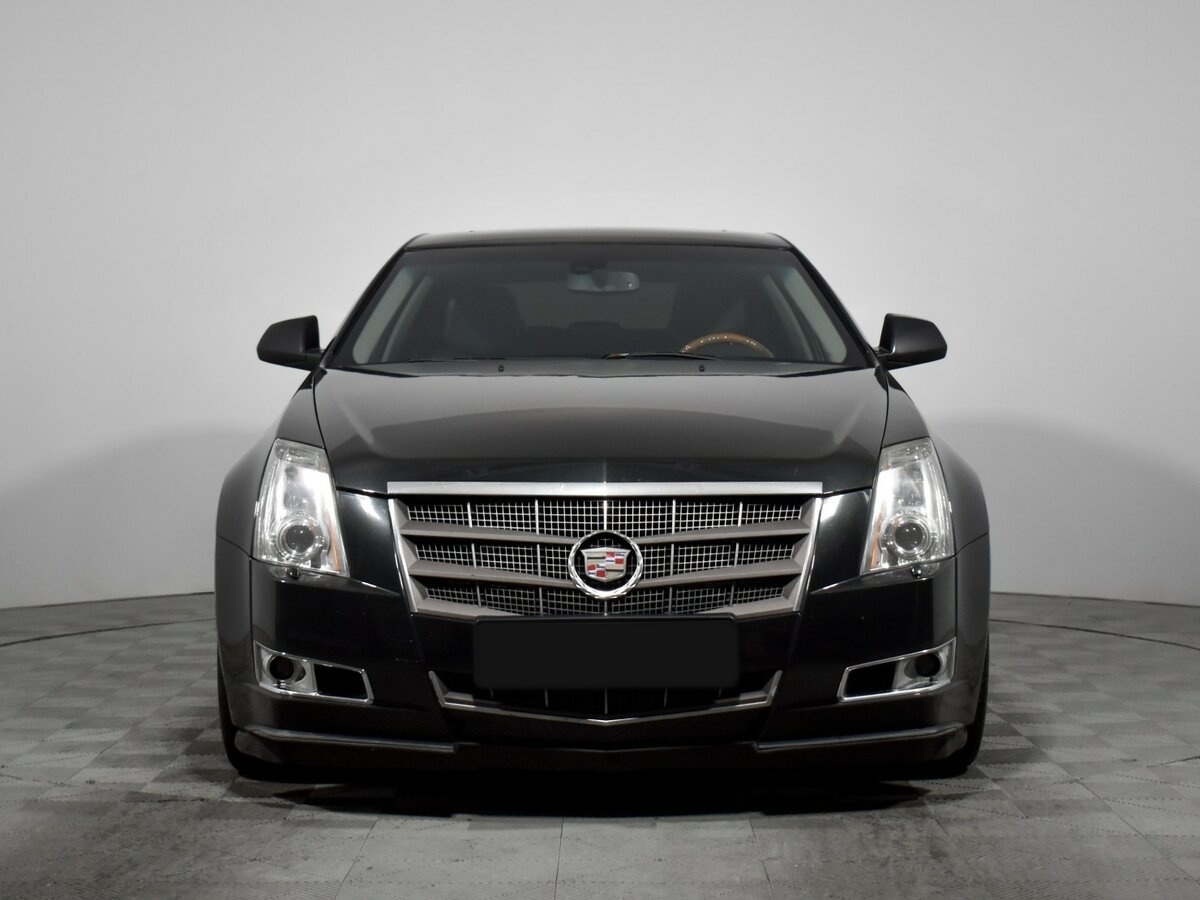 Cadillac CTS с пробегом — 2011 год. Фото: #1