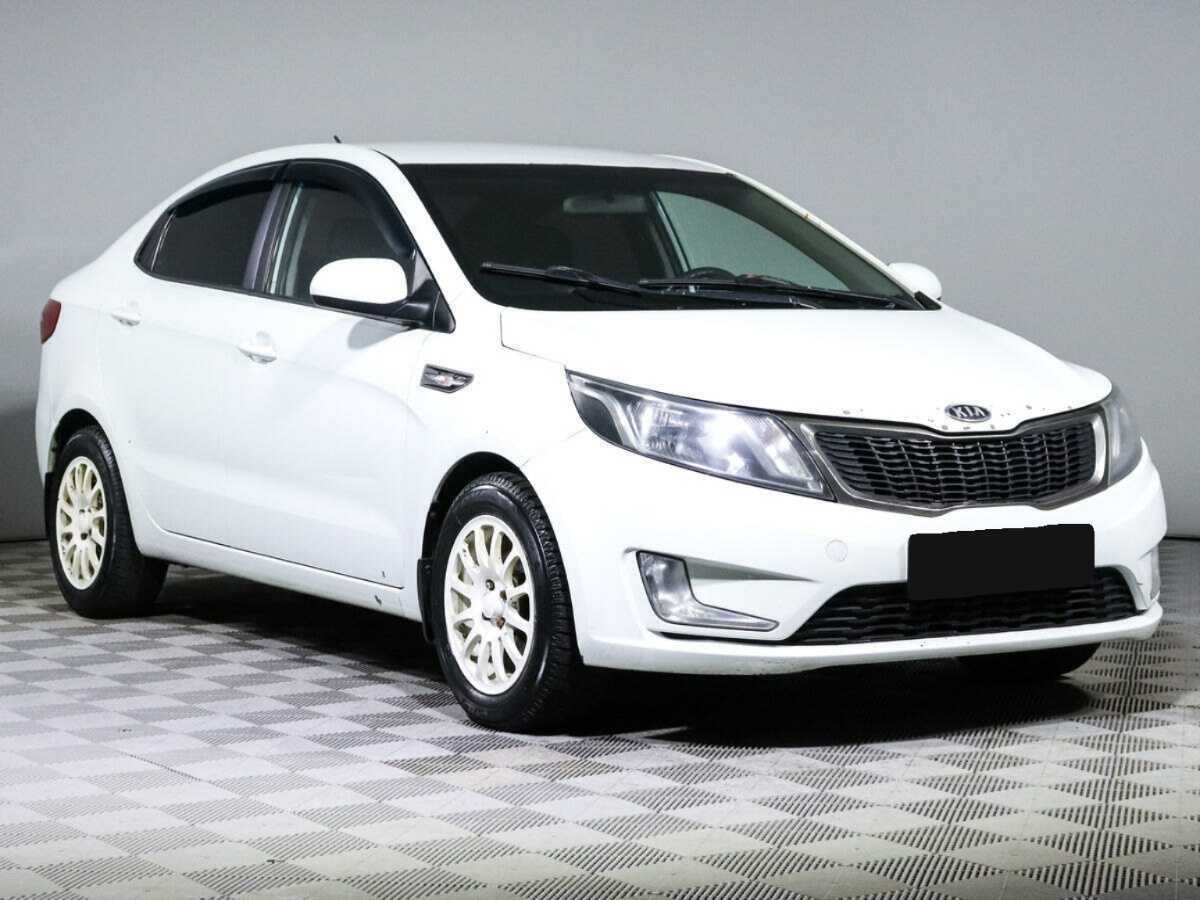 Kia Rio с пробегом — 2011 год. Фото: #2