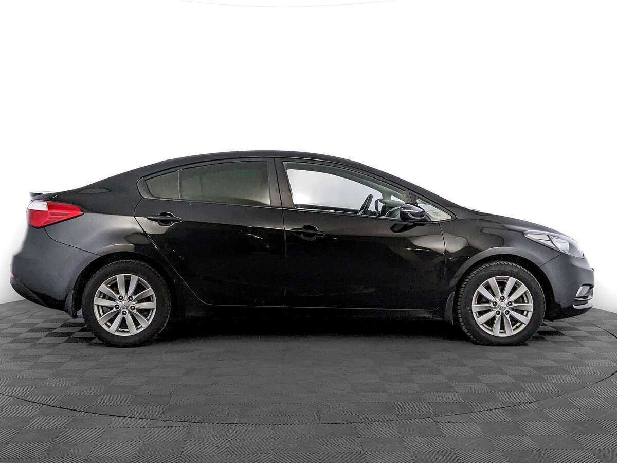 Kia Cerato с пробегом — 2015 год. Фото: #3