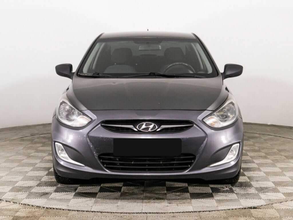 Hyundai Solaris с пробегом — 2013 год. Фото: #1