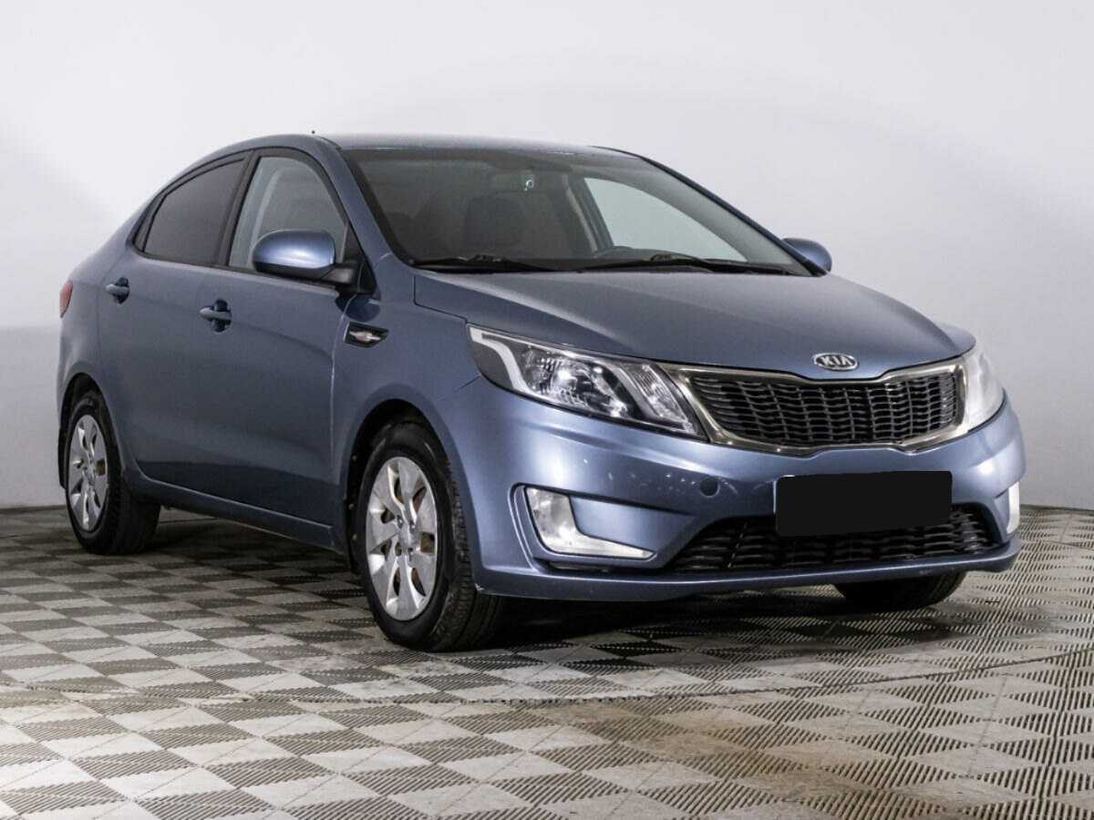 Kia Rio с пробегом — 2012 год. Фото: #2