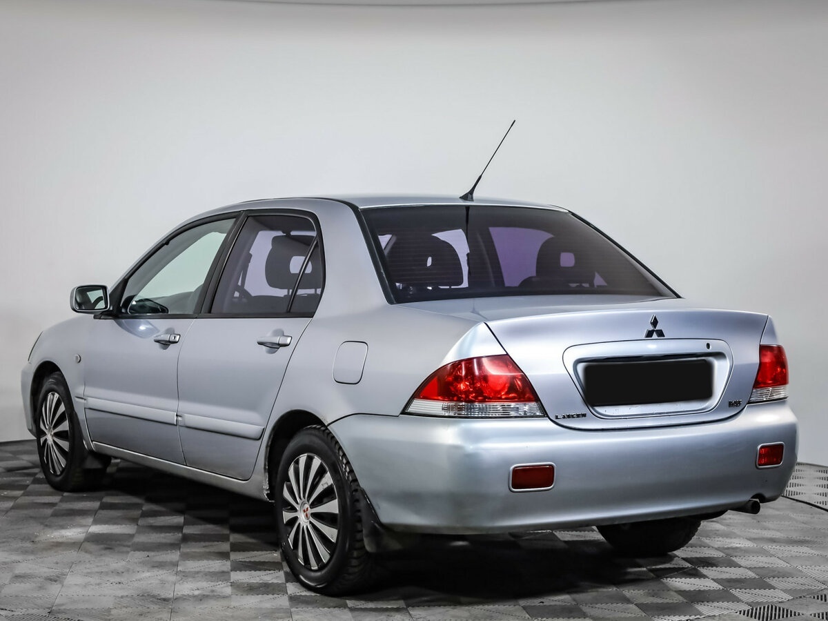 Mitsubishi Lancer с пробегом — 2006 год. Фото: #5