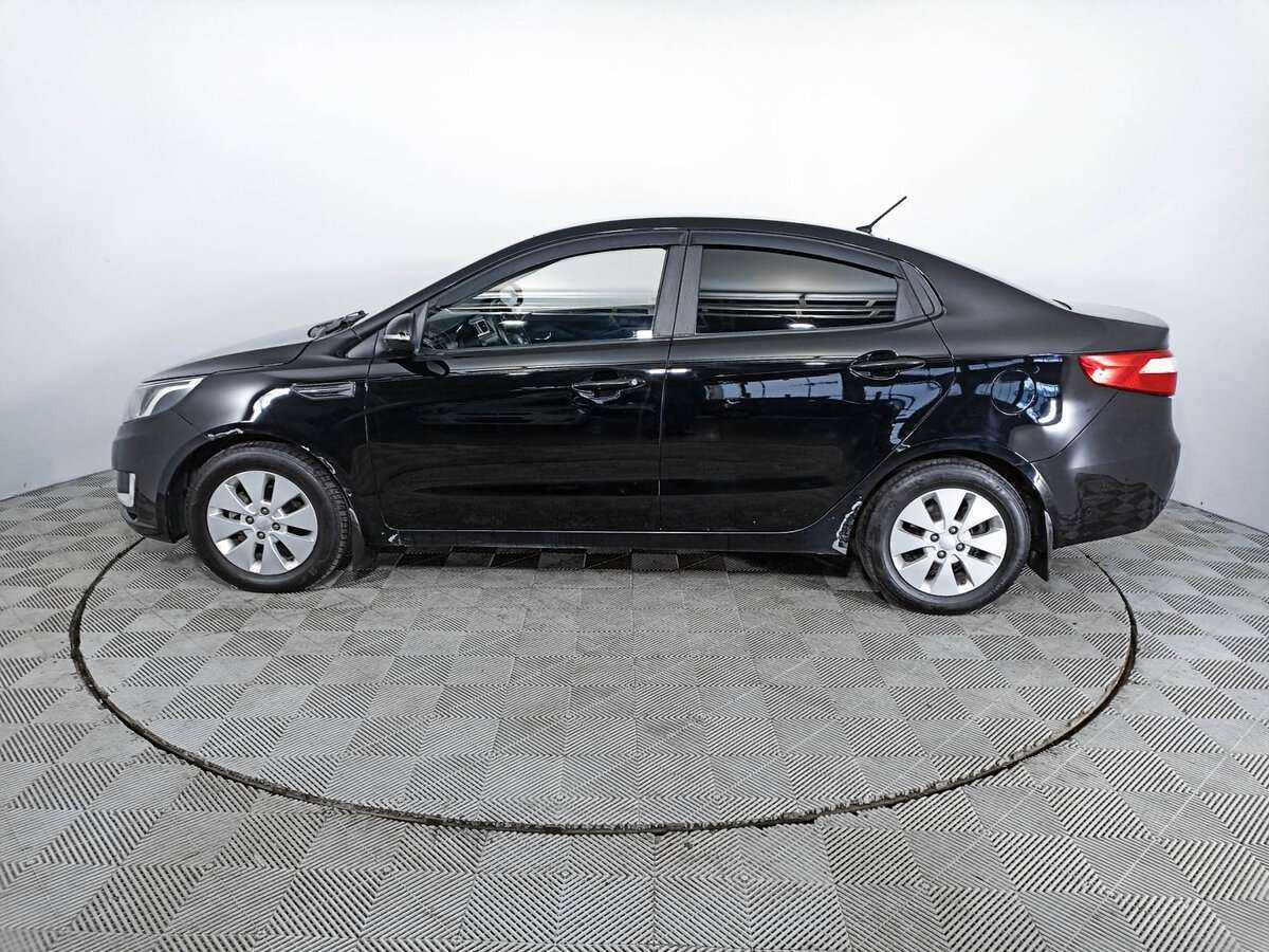 Kia Rio с пробегом — 2011 год. Фото: #7