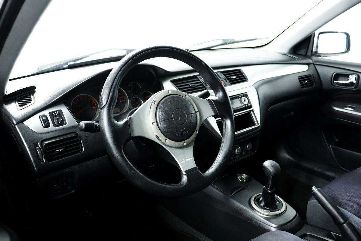 Mitsubishi Lancer с пробегом — 2005 год. Фото: #12