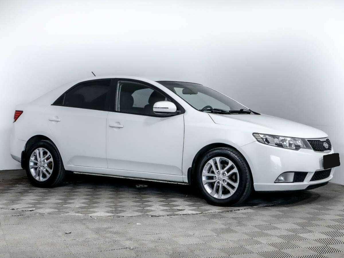 Kia Cerato с пробегом — 2011 год. Фото: #2