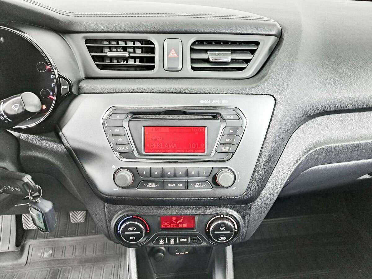 Kia Rio с пробегом — 2013 год. Фото: #12