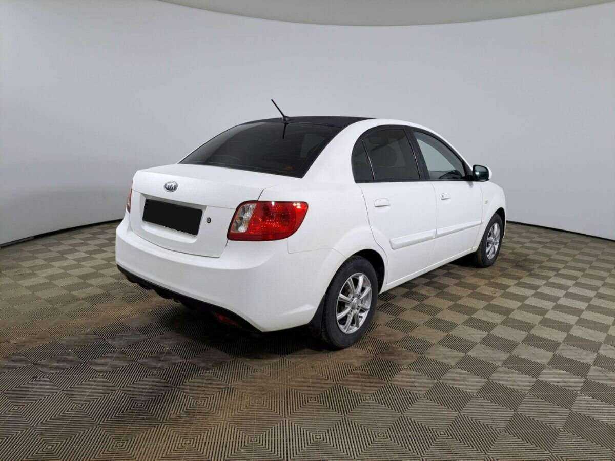 Kia Rio с пробегом — 2011 год. Фото: #4