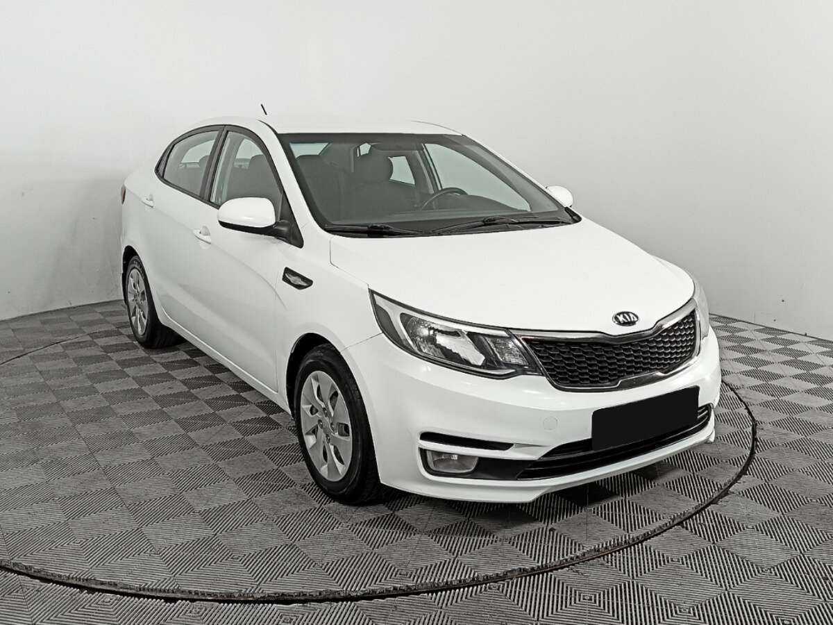 Kia Rio с пробегом — 2015 год. Фото: #2