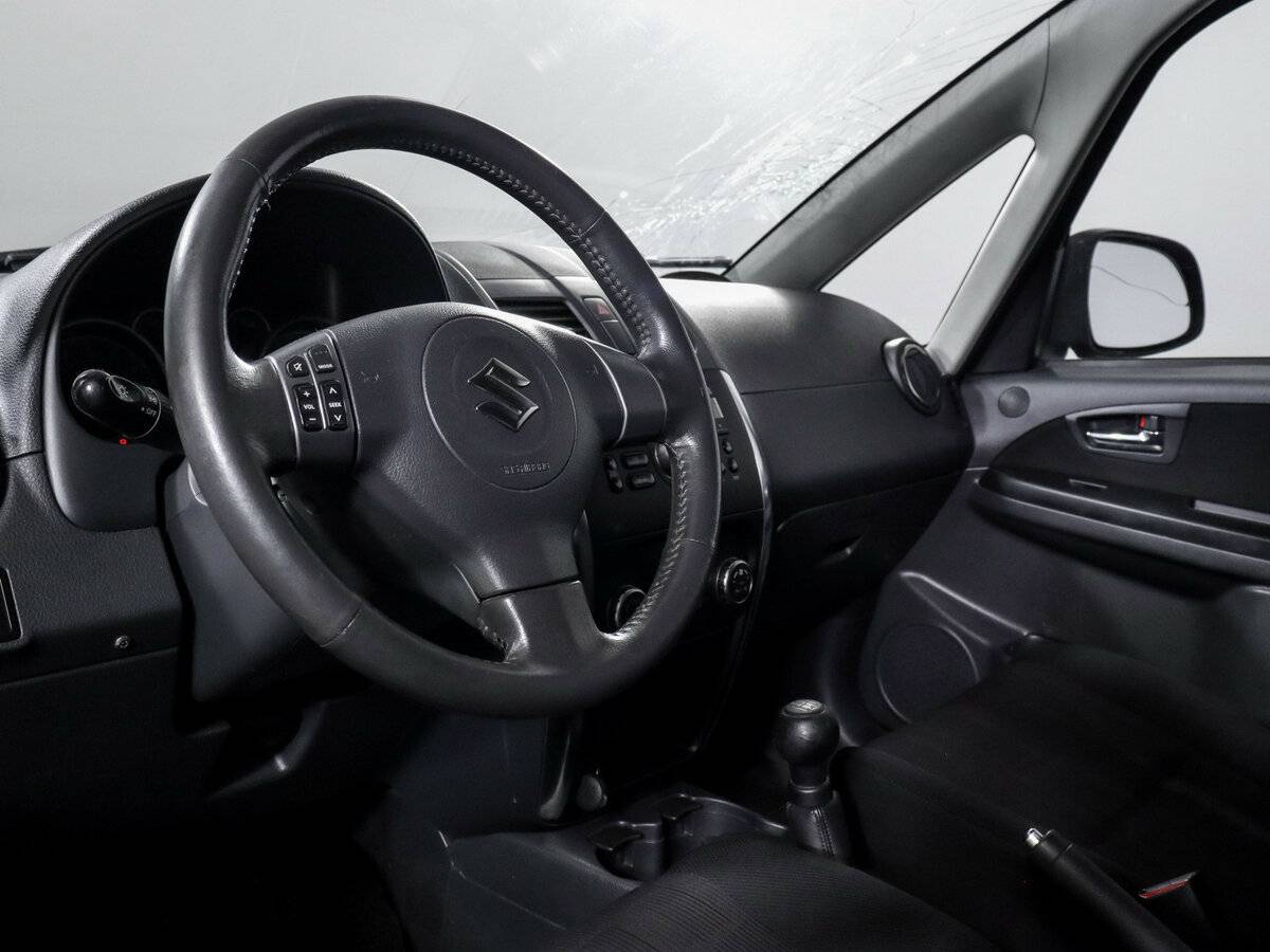 Suzuki SX4 с пробегом — 2010 год. Фото: #11