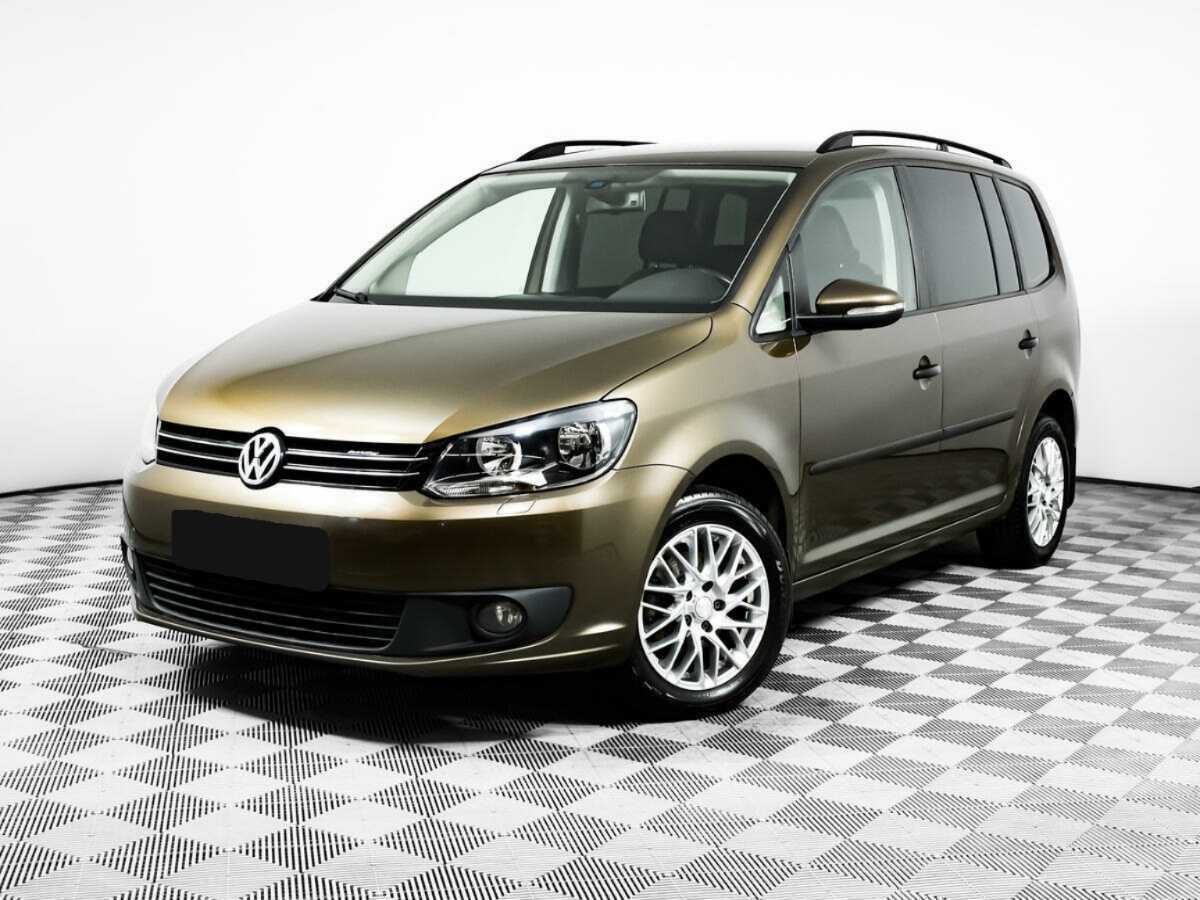 Volkswagen Touran с пробегом — 2013 год. Фото: #0