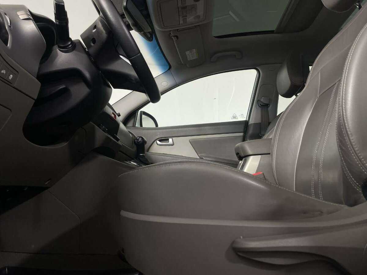 Kia Sportage с пробегом — 2011 год. Фото: #9