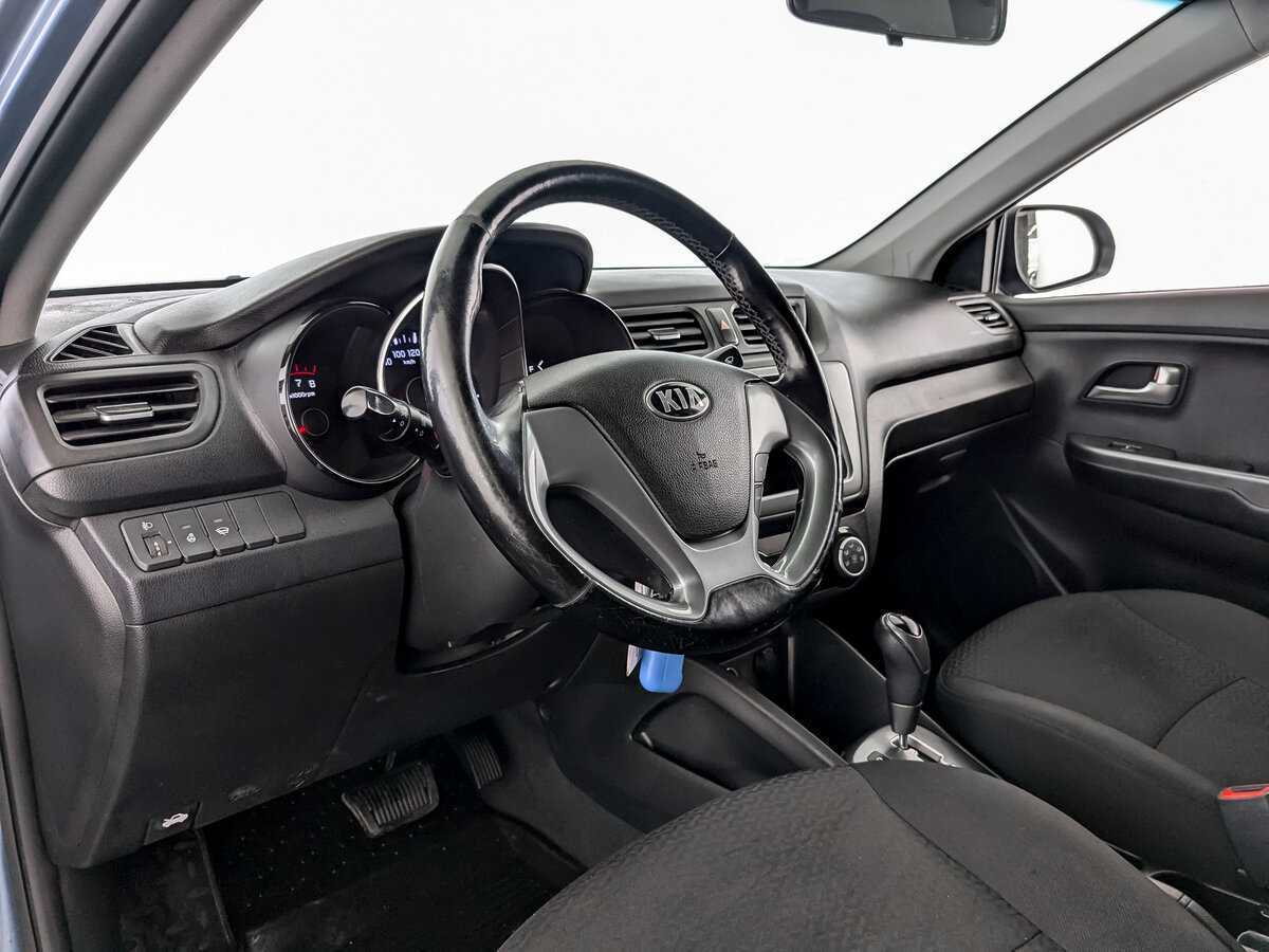 Kia Rio с пробегом — 2015 год. Фото: #13