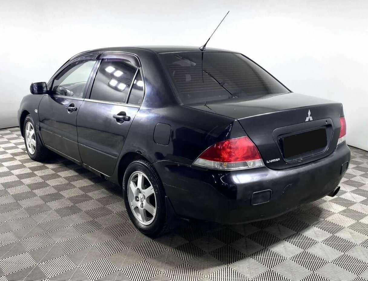 Mitsubishi Lancer с пробегом — 2006 год. Фото: #5