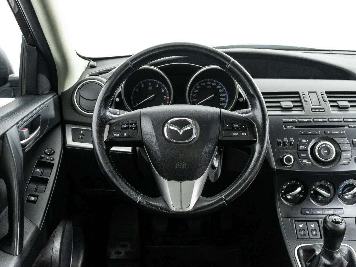 Mazda 3 с пробегом — 2011 год. Фото: #15