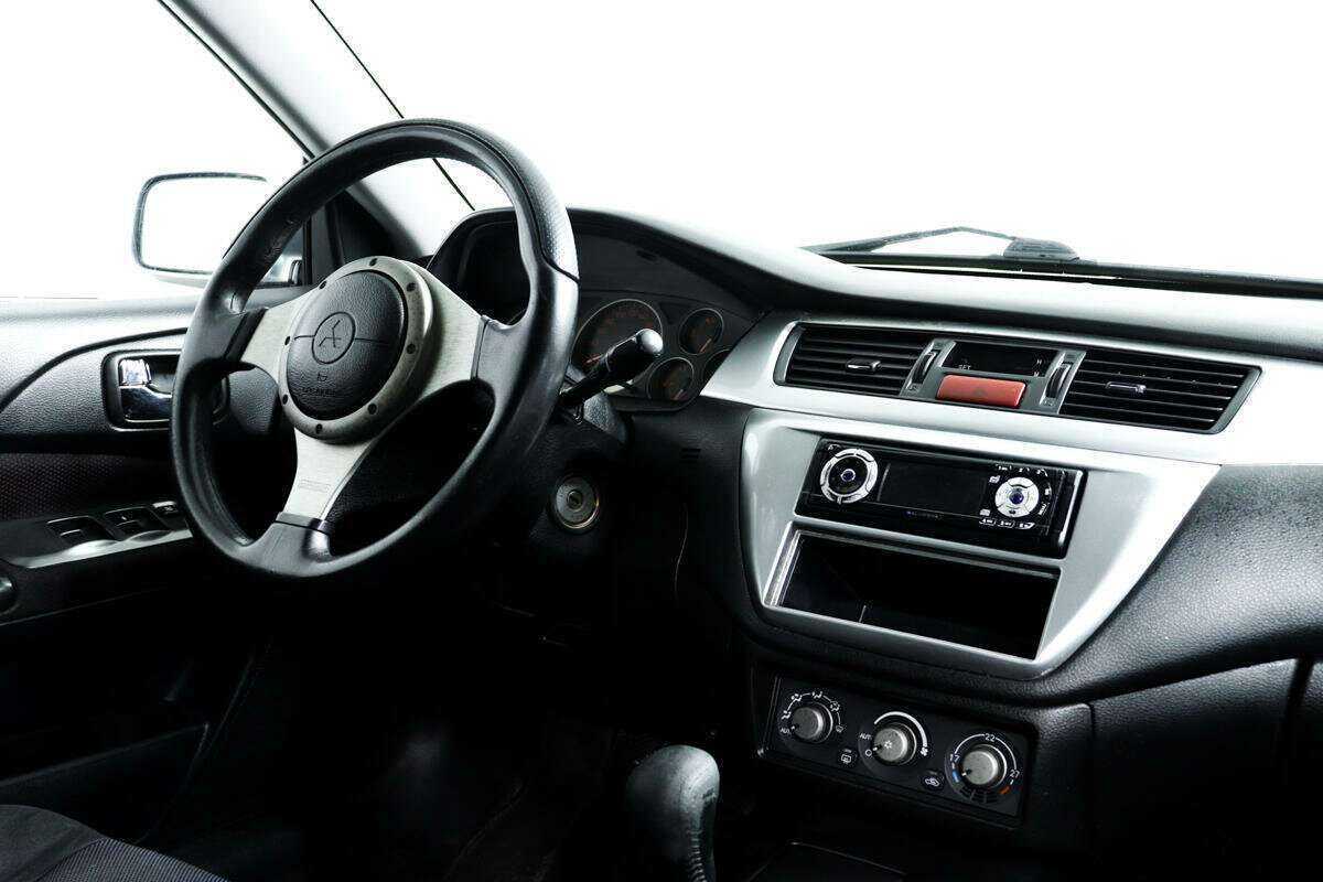 Mitsubishi Lancer с пробегом — 2005 год. Фото: #8