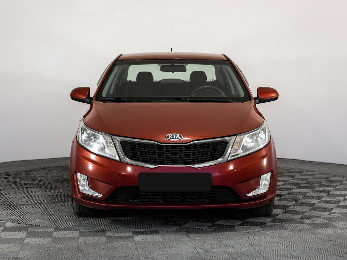 Kia Rio с пробегом — 2011 год. Фото: #1