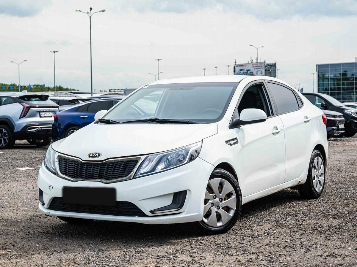 Kia Rio с пробегом — 2014 год. Фото: #0