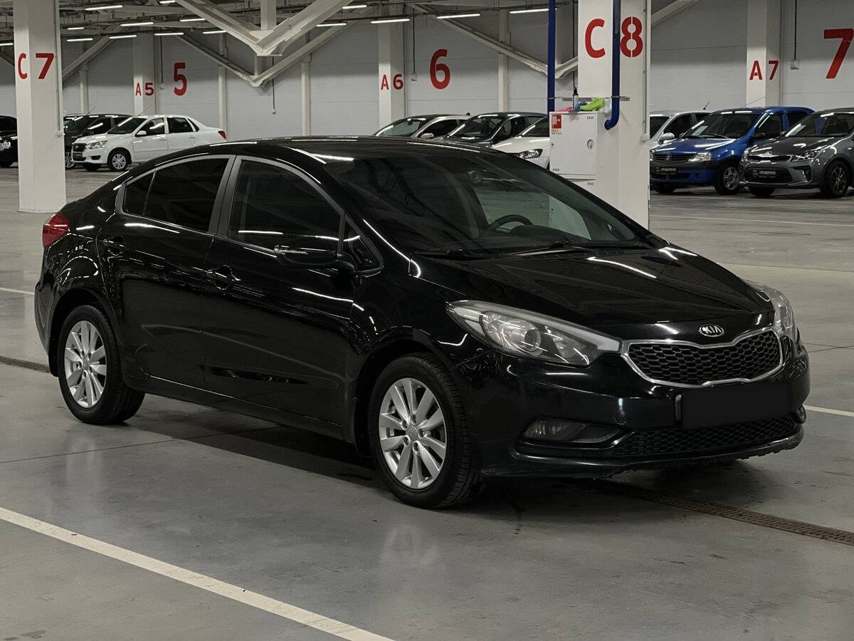Kia Cerato с пробегом — 2014 год. Фото: #2