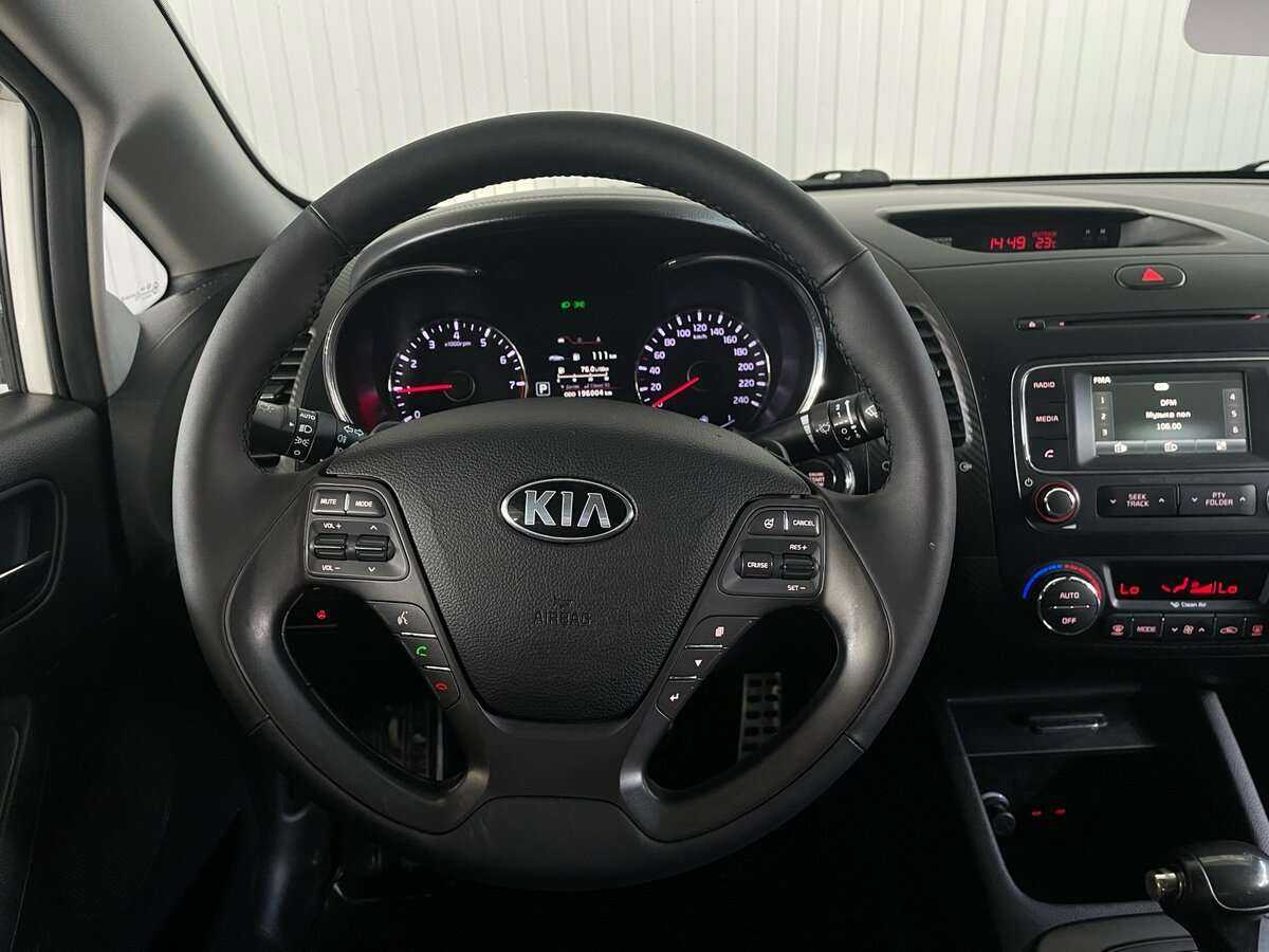 Kia Cerato с пробегом — 2014 год. Фото: #10