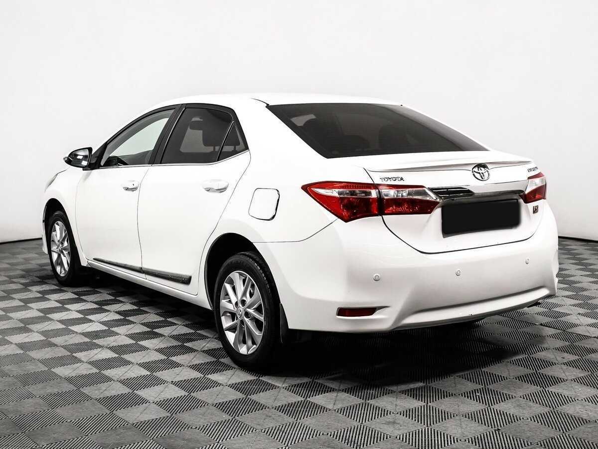 Toyota Corolla с пробегом — 2013 год. Фото: #6