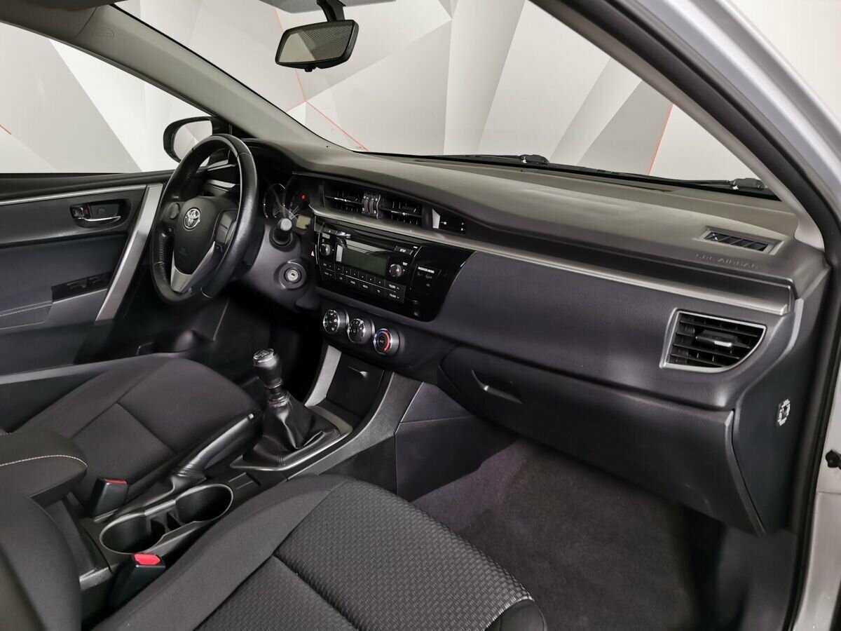 Toyota Corolla с пробегом — 2013 год. Фото: #8