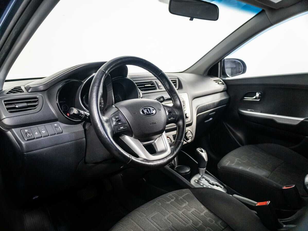 Kia Rio с пробегом — 2013 год. Фото: #9