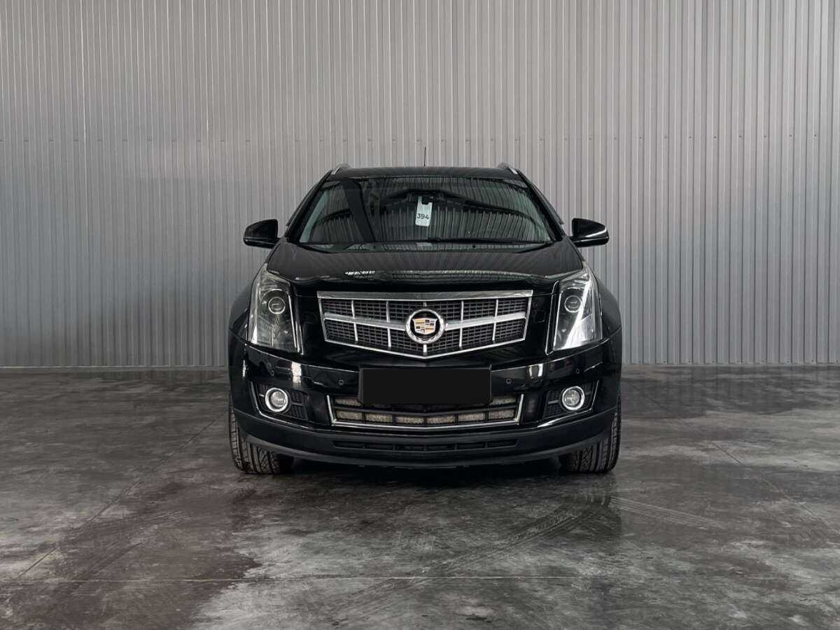 Cadillac SRX с пробегом — 2010 год. Фото: #1