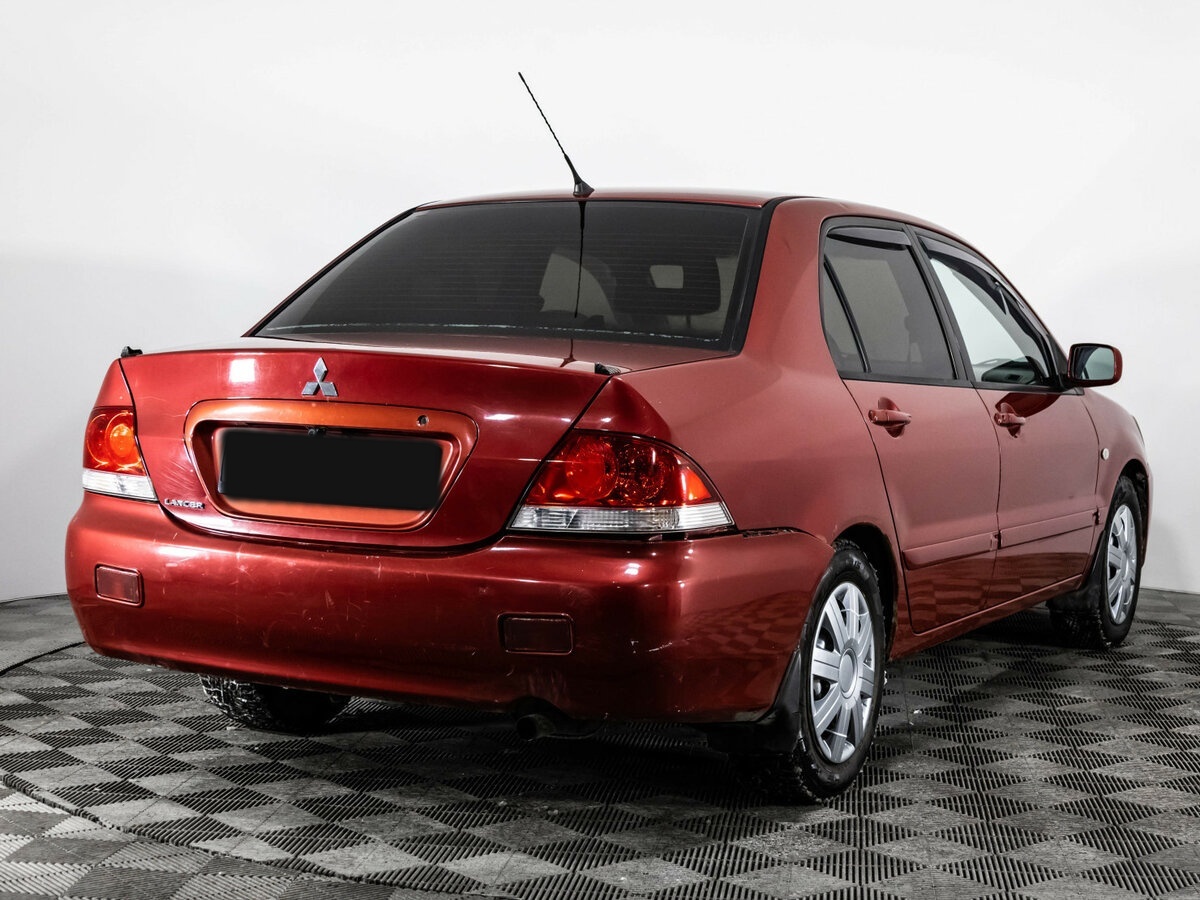 Mitsubishi Lancer с пробегом — 2005 год. Фото: #3