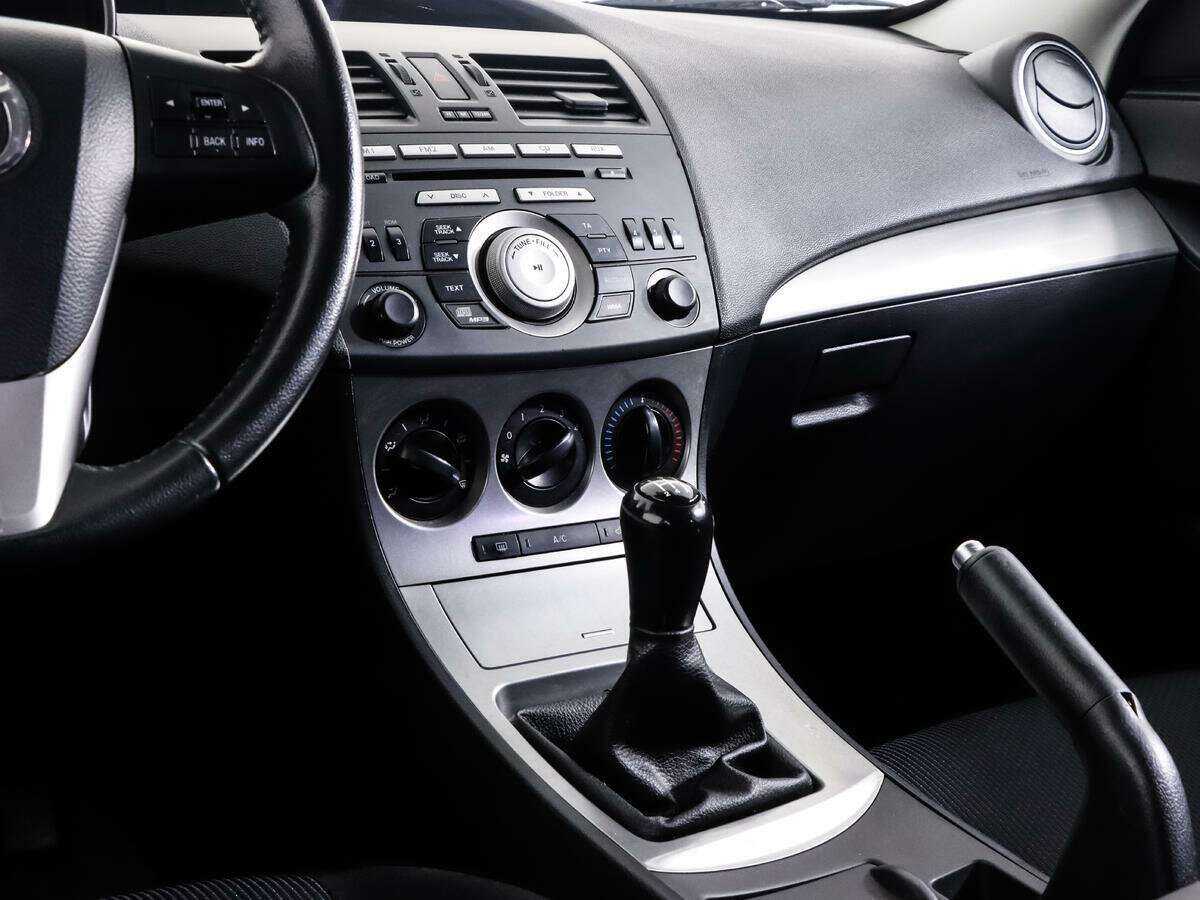 Mazda 3 с пробегом — 2010 год. Фото: #11