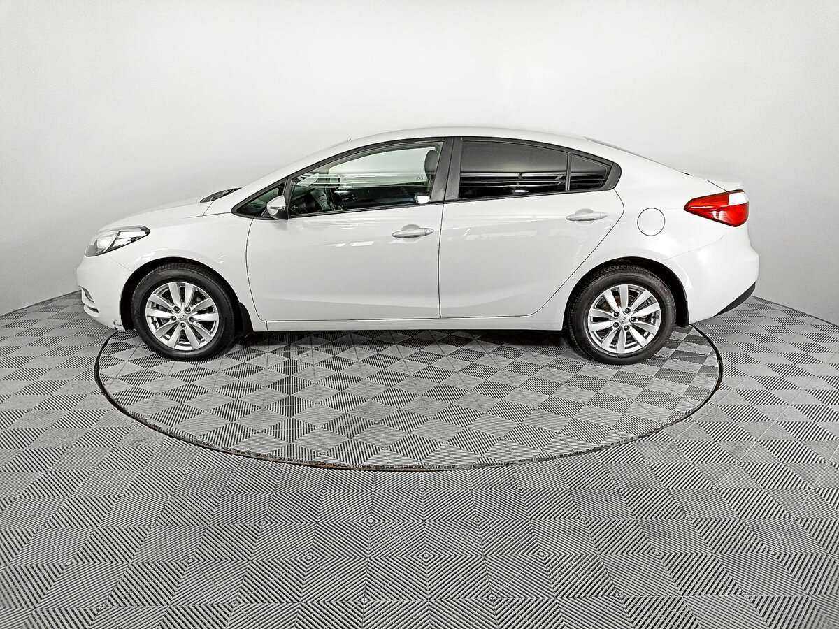 Kia Cerato с пробегом — 2014 год. Фото: #7