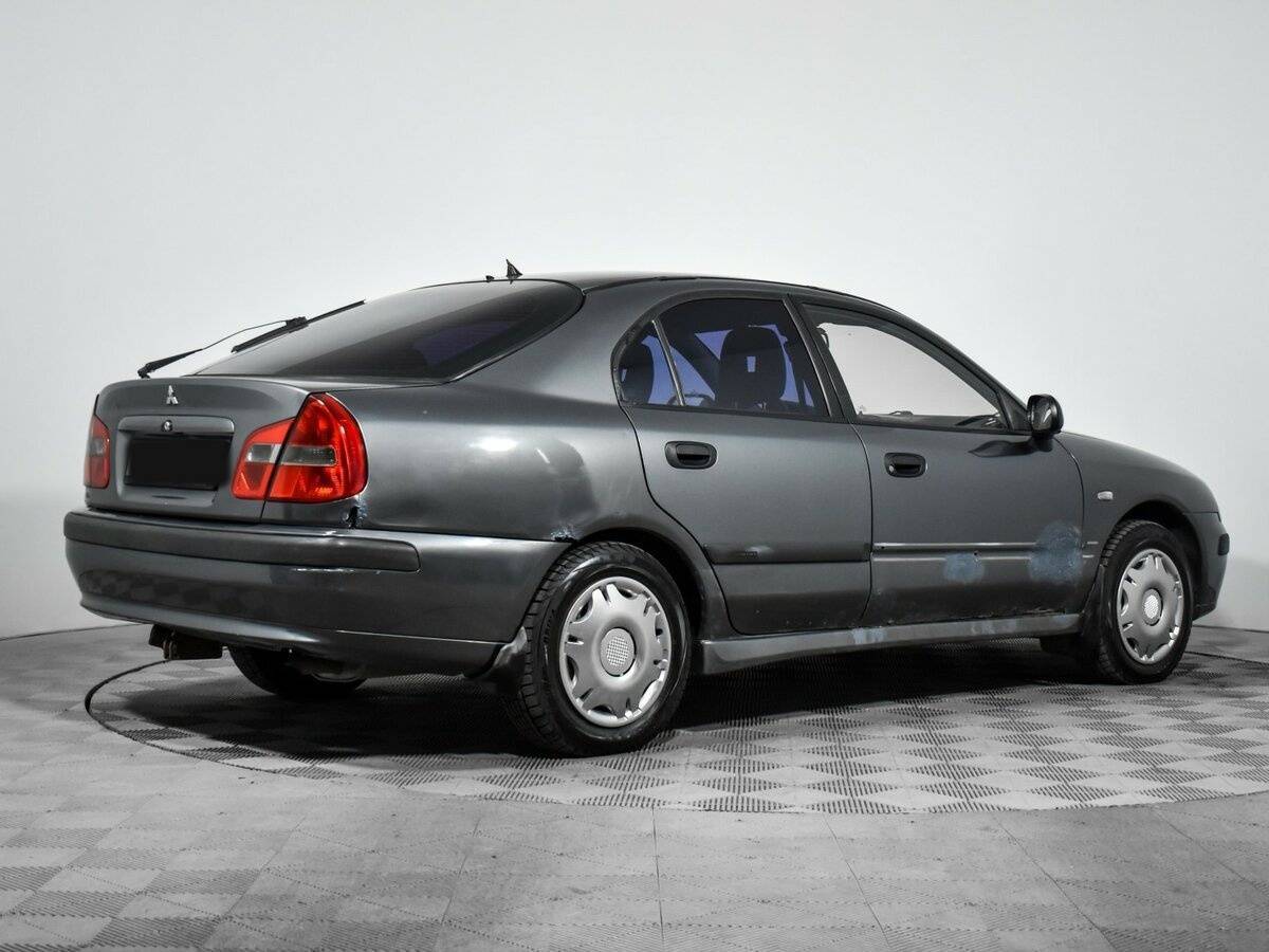 Mitsubishi Carisma с пробегом — 2003 год. Фото: #4