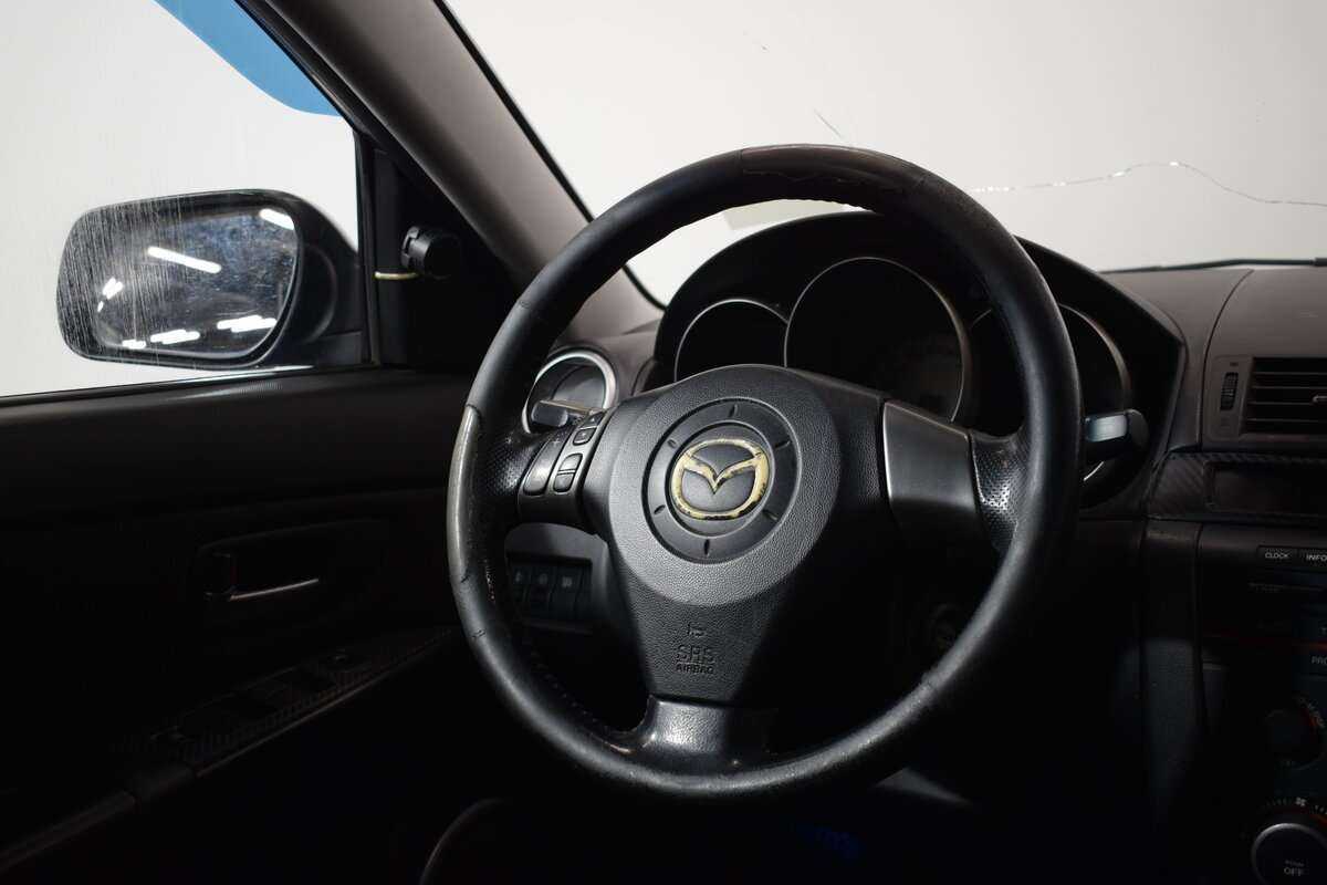 Mazda 3 с пробегом — 2006 год. Фото: #8