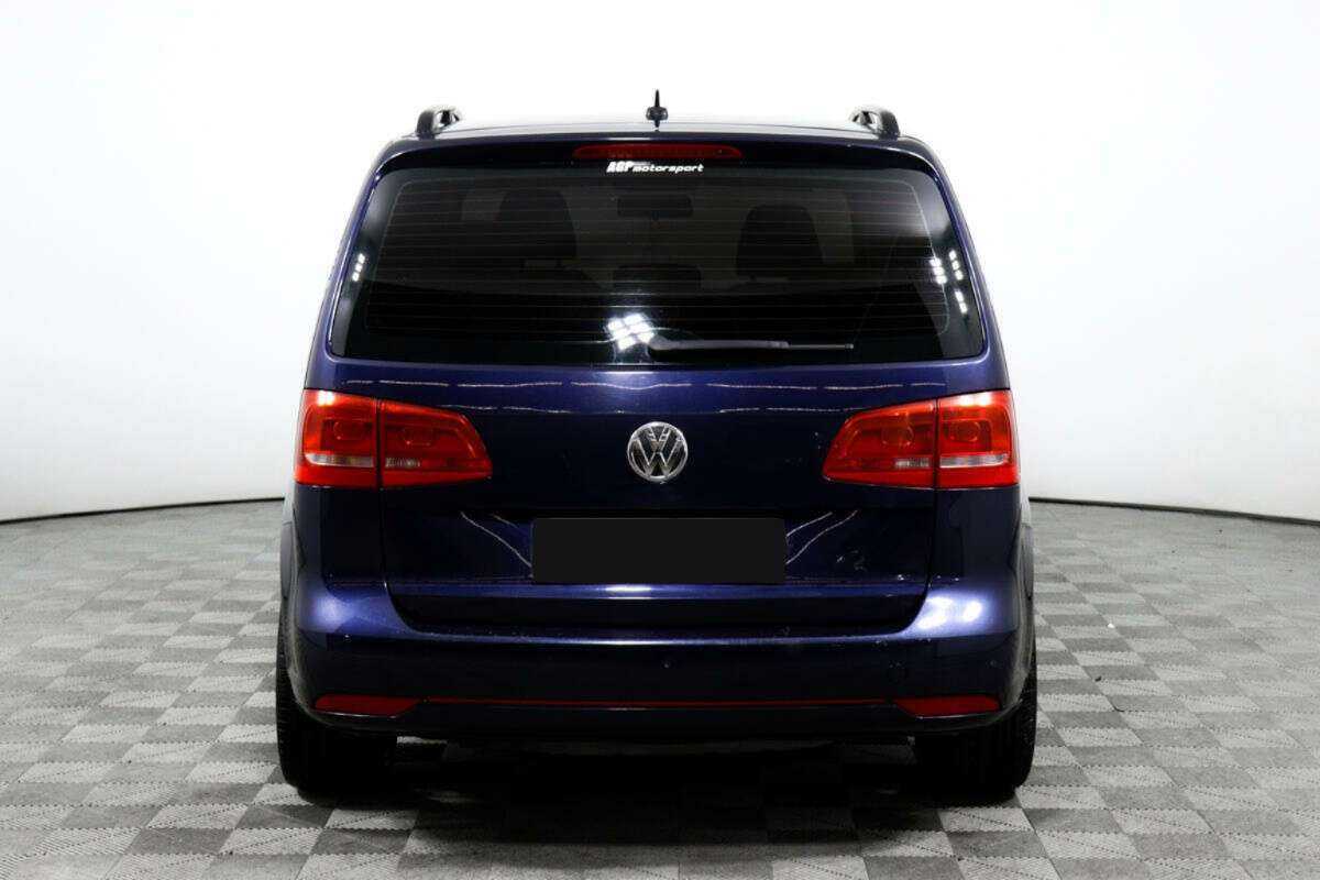 Volkswagen Touran с пробегом — 2012 год. Фото: #5