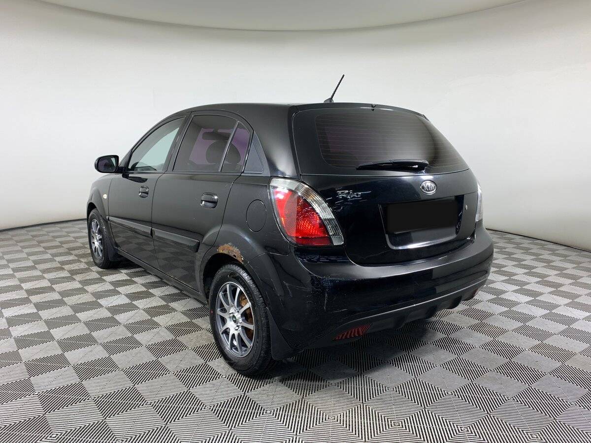 Kia Rio с пробегом — 2010 год. Фото: #6