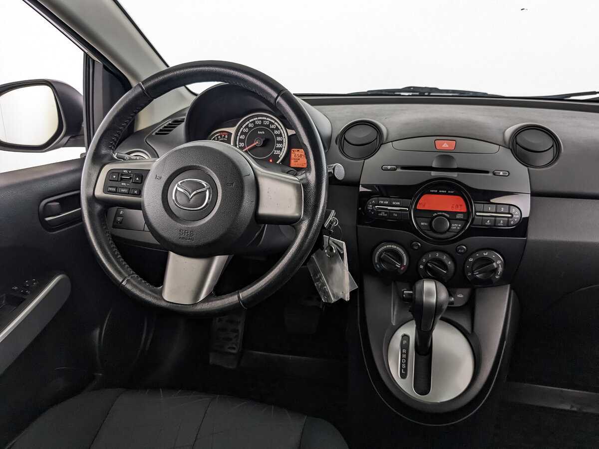 Mazda 2 с пробегом — 2013 год. Фото: #20