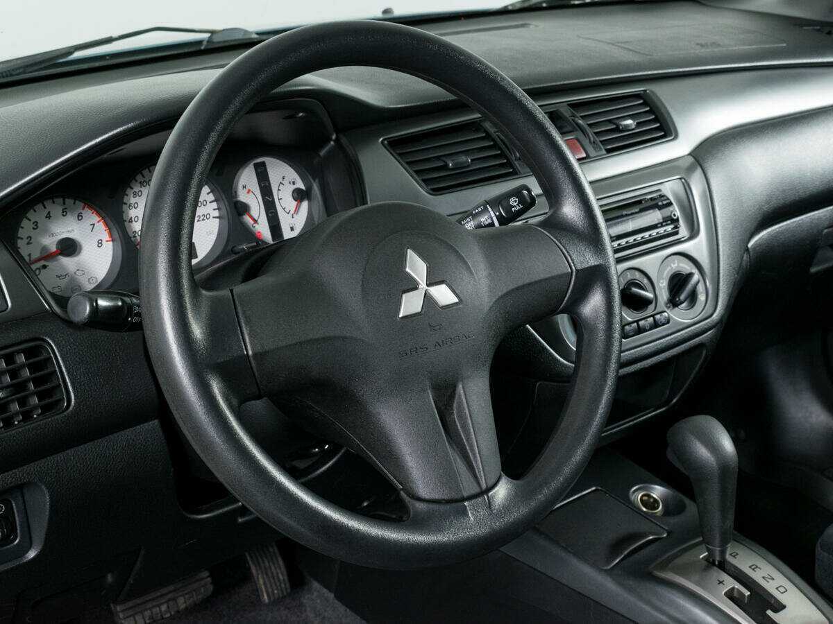 Mitsubishi Lancer с пробегом — 2006 год. Фото: #13