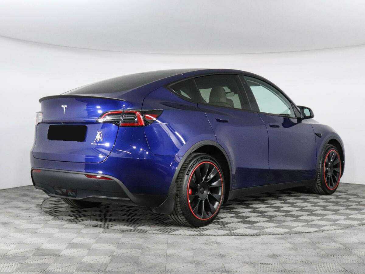 Tesla Model Y с пробегом — 2023 год. Фото: #4