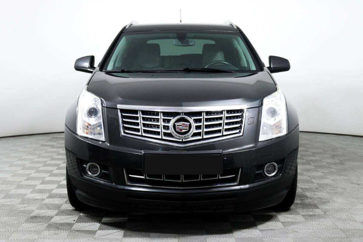 Cadillac SRX с пробегом — 2014 год. Фото: #1
